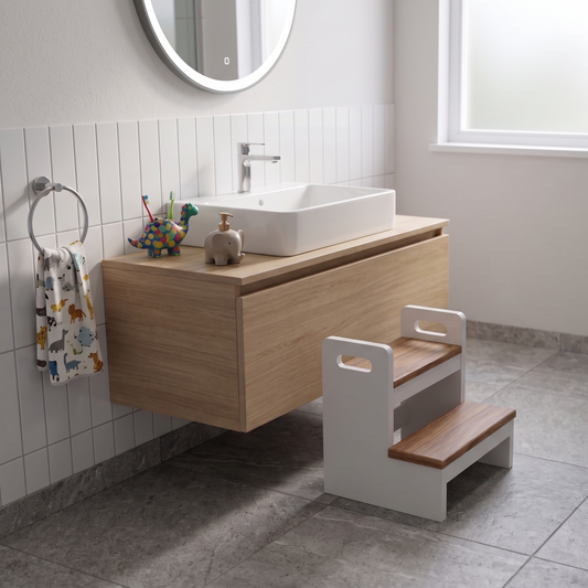 The Little Helper painted white with hardwax oil applied to the steps to create a two tone finish on a kids helper step stool for use in a bathroom or kitchen.
